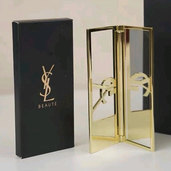 Yves Saint Laurent Accessories - New in Box Yves Saint
Laurent YSL Logo Beauty
Makeup Mirror Gold Color